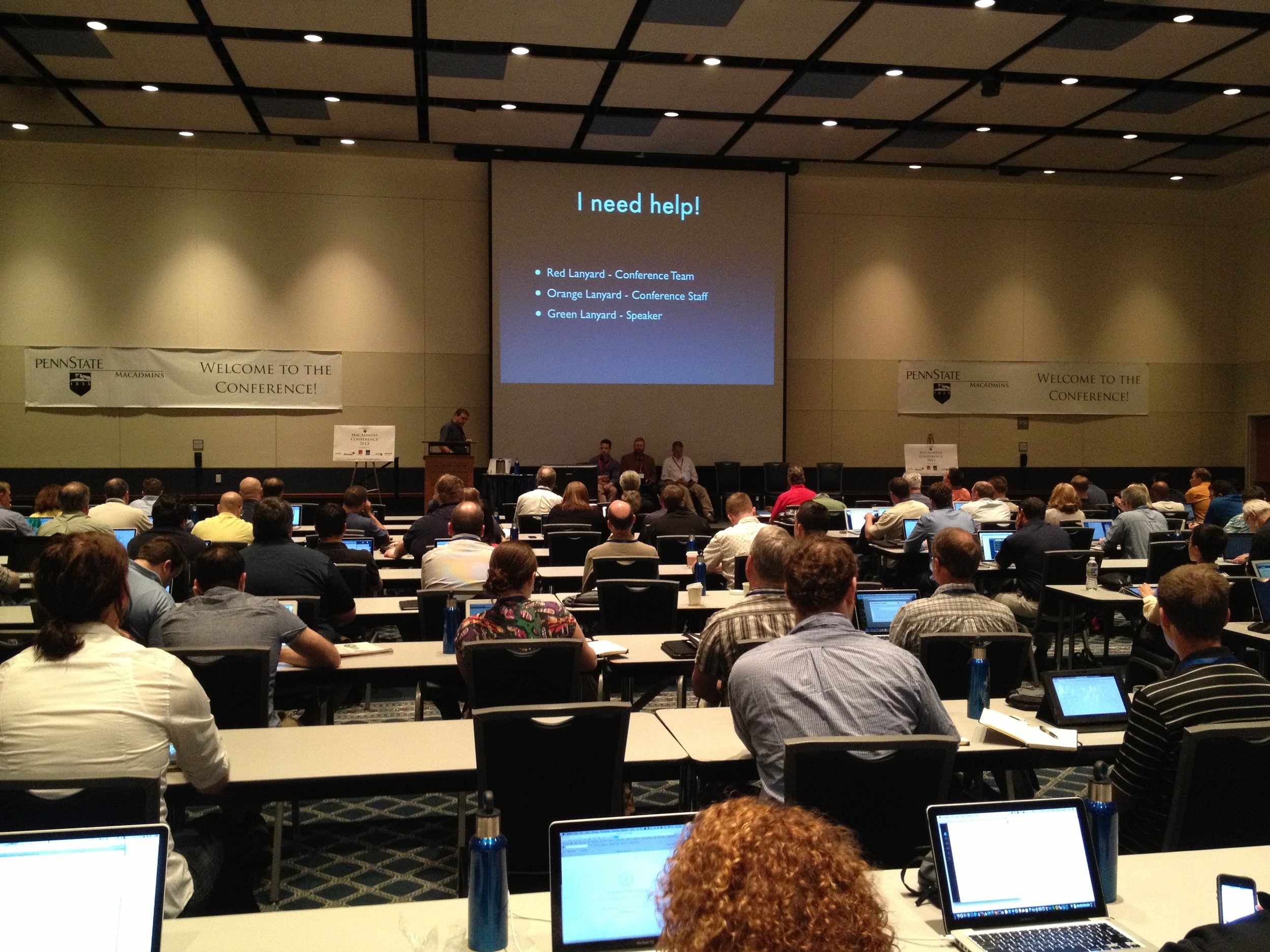 Attendees with laptops fill a session room at the MacAdmins Conference at Penn State